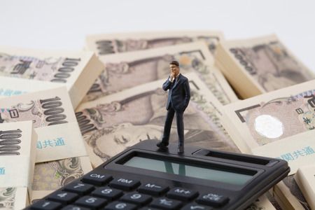 Business people think about money figuresの写真素材