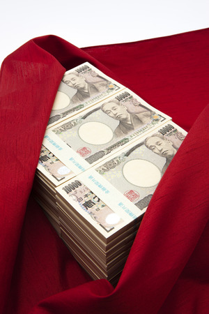 Cash wrapped in a cloth の写真素材