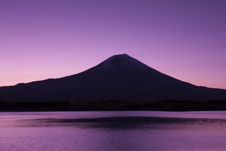 The dawn of Mount Fuji from Lake Tanukiの写真素材