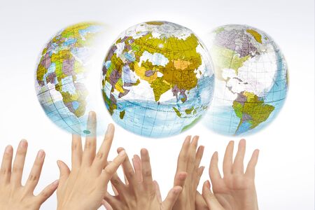 The hands of the world map and womenの写真素材