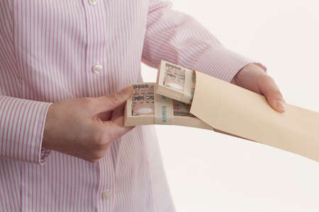 Woman with a pay packet