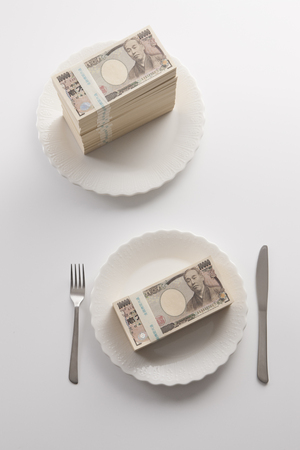 Money on a plateの写真素材