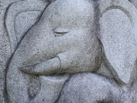 Relief of elephant that was carved in stoneの写真素材