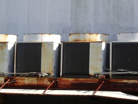 Air conditioners old outdoor unitの写真素材