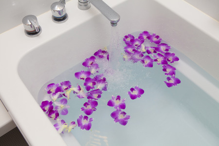 Orchid floating in the bathtubの写真素材