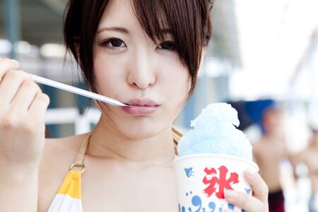 Poker women eating iceの写真素材