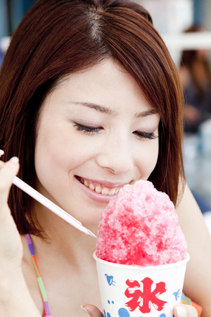 Poker women eating iceの写真素材