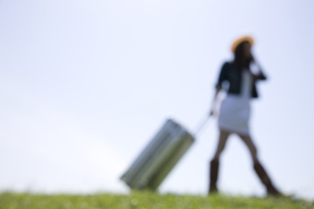 Women are pulling the carry-backの写真素材