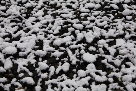 Stones in the snowの写真素材