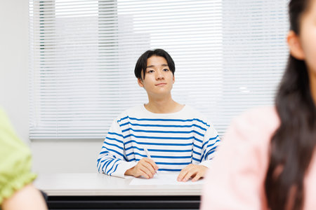 Asian teenagers studying in tuition classの写真素材