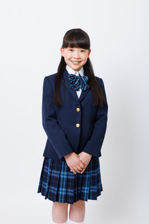 Portrait of Japanese girl in school uniformの写真素材