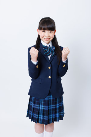 Portrait of Japanese girl in school uniformの写真素材