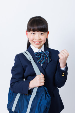 Portrait of Japanese girl in school uniformの写真素材