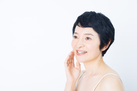 Mature Japanese woman with beauty skincare conceptの写真素材
