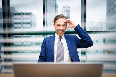 Businessman videoconferencing in the officeの写真素材