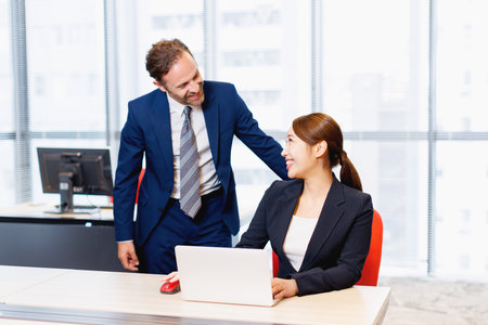 People discussing about work in the officeの写真素材