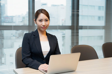 Asian businesswoman at work in the officeの写真素材