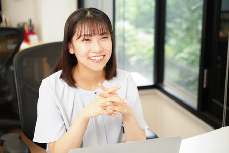 Beautiful Japanese woman in office