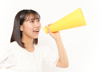 Japanese woman with cheering gestureの写真素材