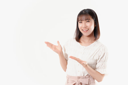 Japanese woman with showing poseの写真素材