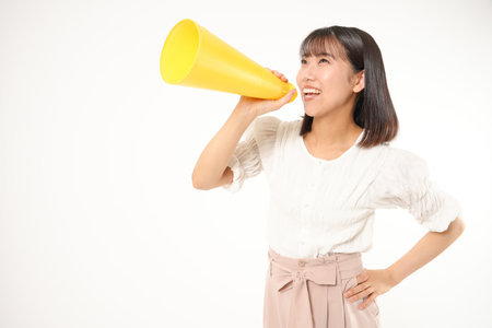 Japanese woman with cheering gestureの写真素材