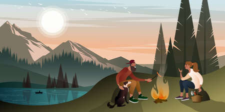 Young couple with a dog on a halt near a campfire in the mountains on a warm summer evening. Flat...