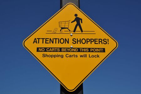 Attention shoppers sign の写真素材