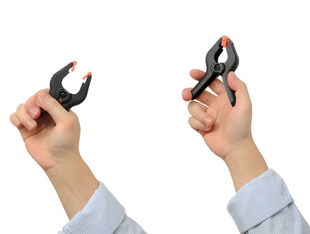 Business man holding spring clampの写真素材