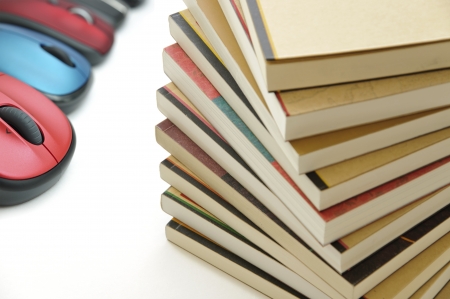 Books and mouses on white backgroundの写真素材