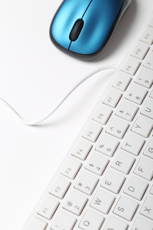 White keyboard and blue mouse の写真素材