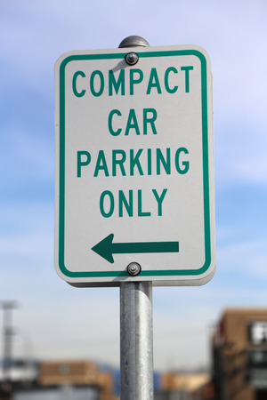 Compact car parking only sign の写真素材