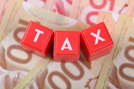 Tax block on money backgroundの写真素材