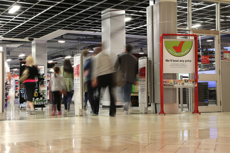 Coquitlam BC Canada - May 10, 2014 : People shopping in future shop store with motion blur inside Coquitlam Center mall on May 10, 2014. のeditorial素材