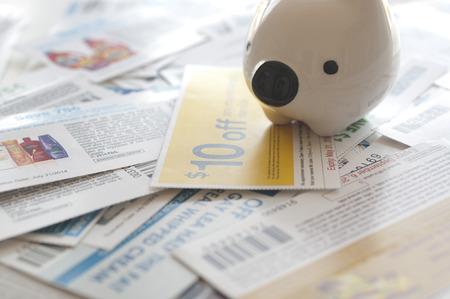 Coquitlam, BC Canada - November 11, 2014 : Abstract saving money concept. All coupons for Canadian store, they are issued by manufacturers of consumer packaged goods Canada.のeditorial素材