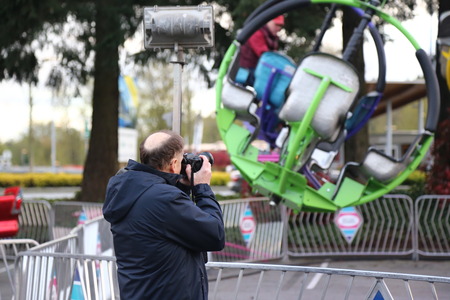 Coquitlam, BC, Canada - April 09, 2015 : People having fun at the West Coast Amusements Carnivalのeditorial素材