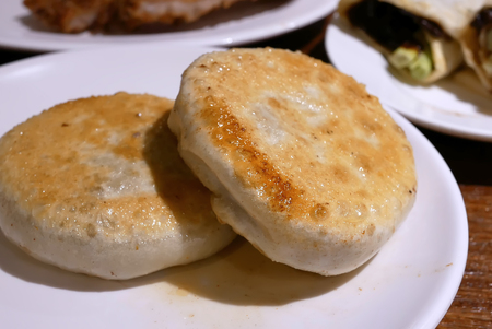 Close up of beef pastry on table inside Chinese restaurant