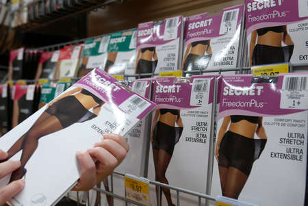 Woman buying Secret control panty inside Walmart store