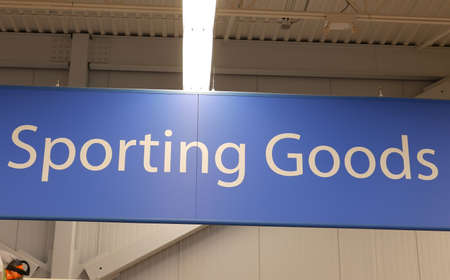 Motion of sporting good sign on sport equipment section inside store