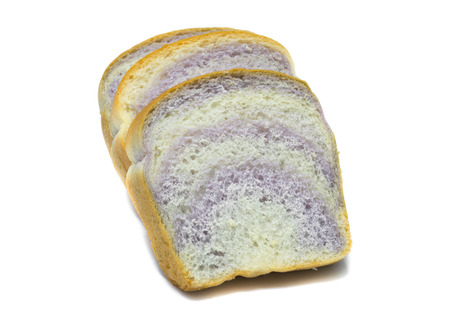 taro sliced bread close up  on white backgroundの写真素材