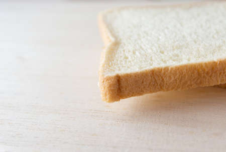 Slice  bread on a wooden tableの写真素材