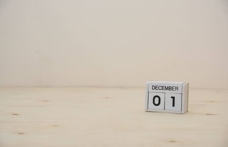  AIDS day 1 December wooden cube calendar on wood surface with copy space