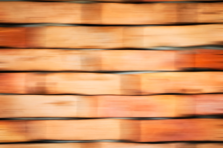Abstract blurry red brick for background and wallpaperの写真素材