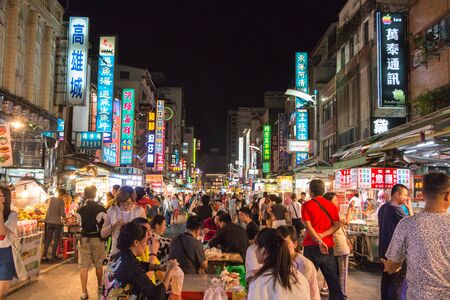KAOHSIUNG, TAIWAN - APR 20 : Taiwan's unique culture, night bazaar attracts many young people to this city, which has become one of Taiwan's culture, on 20 April 2015 in Kaohsiung.のeditorial素材