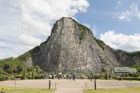 Chonburi, Thailand - June 04, 2016: Tourism visit Khao chee chan in Chonburi province, Khao chee chan the largest buddha carved in the world.のeditorial素材