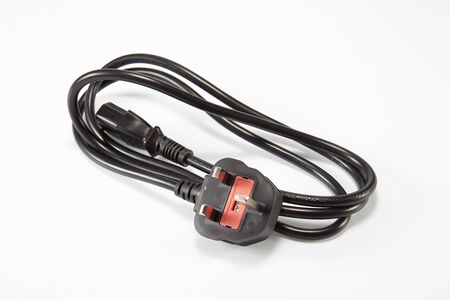 UK power plug isolated on white background.