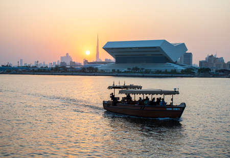 Sunset at Dubai Festival city. New building of Sheikh Muhammad Bin Rashid library on the scene as well as tallest building in the world Burj Khalifa on background. Outdoorsのeditorial素材