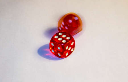 Set of red dice on wooden tableの写真素材