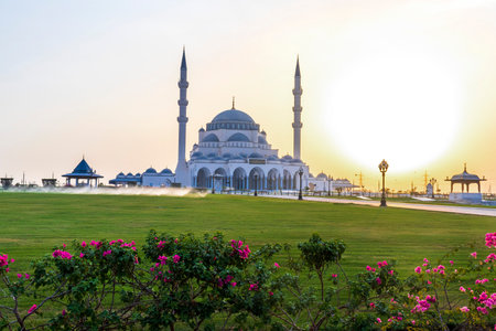 Sharjah, UAE - 07.31.2021 - Sharjah mosque at evening hour.のeditorial素材