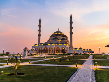 Sharjah, UAE - 07.31.2021 - Sharjah mosque at evening hour.のeditorial素材