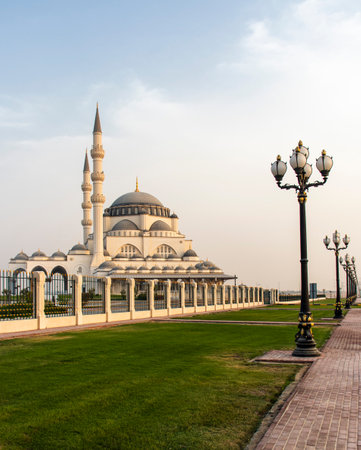 Sharjah, UAE - 07.31.2021 - Sharjah mosque at evening hour.のeditorial素材
